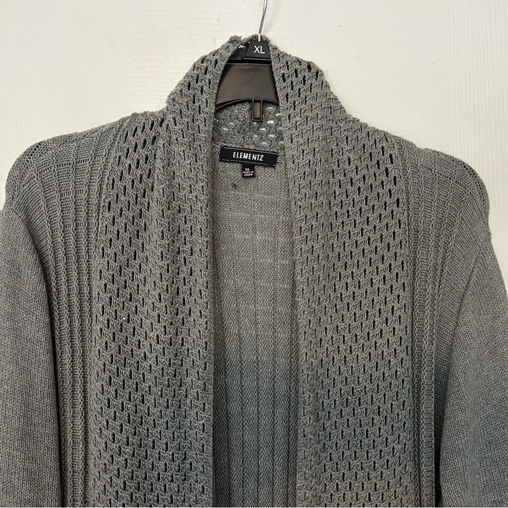 Long sweater with a bit of flair!